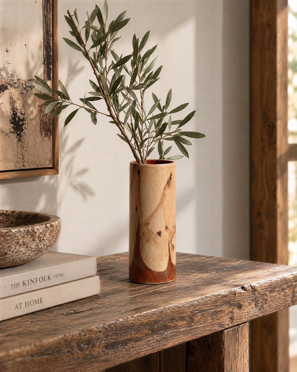 Muse vessel styled with branches on a rustic wood console (branches not included)