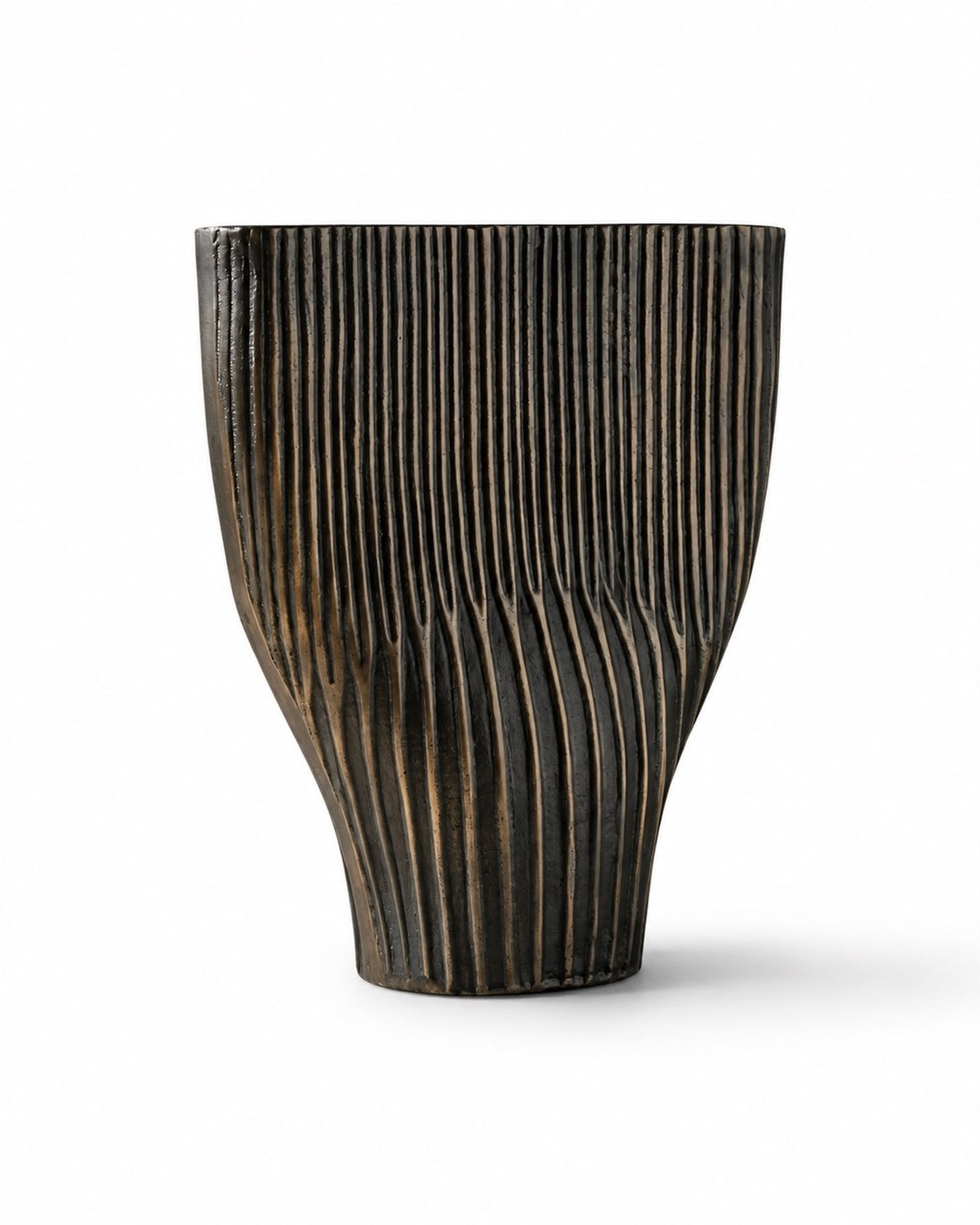 Undertow handmade aluminum vessel in black brass with reeded, twisting lines, front view